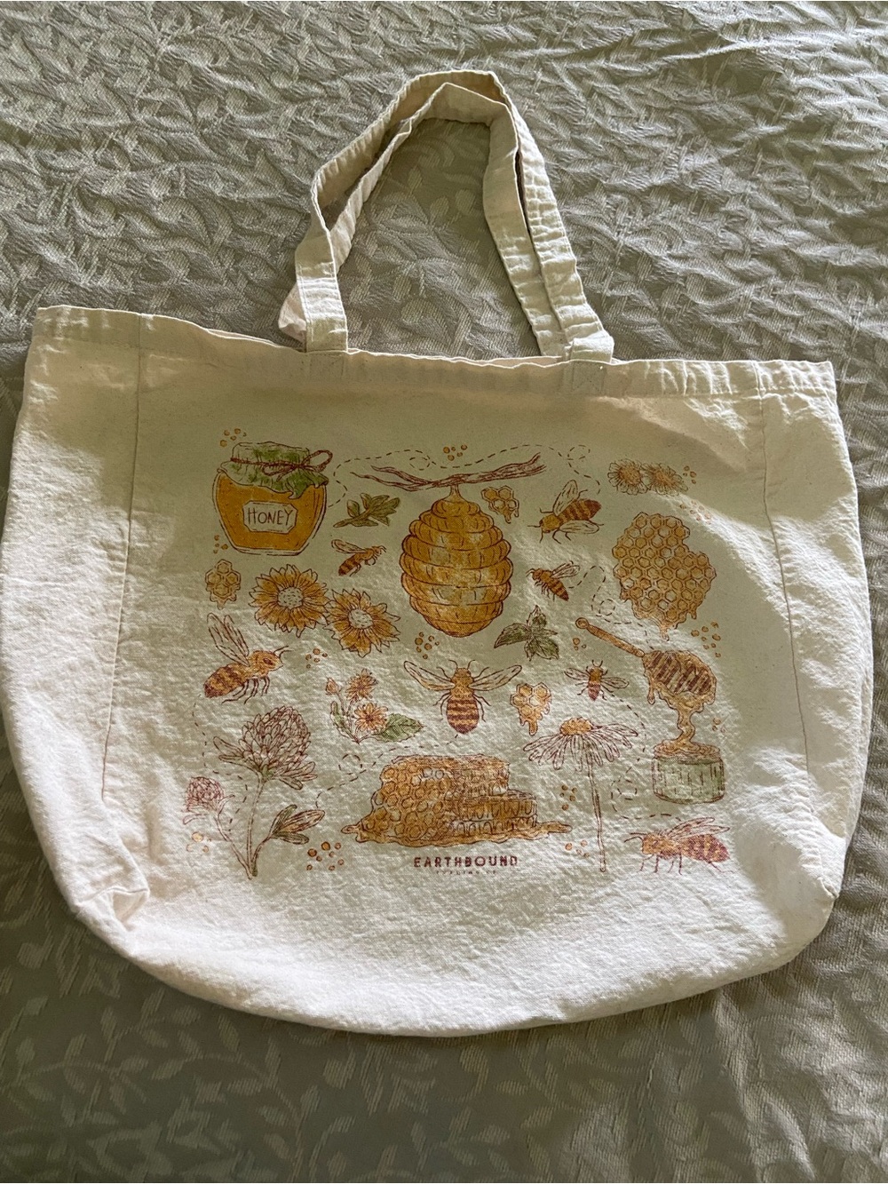 EARTHBOUND Cream Canvas Tote with gold  & Brown Bee Illustration